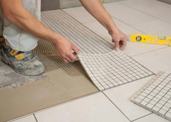 Paul laying with tiles