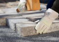 Laying paving slabs or paving stones
