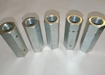 Гайка DIN 1479: шестигранна циліндрична з двома отворами